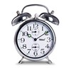 Mechanical lift alarm clock with classic bell ringer, illuminated hands
