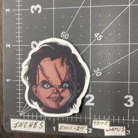 Small Chucky Face Adult Humor Sticker For Skateboard Guitar Ect. Mat133