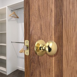 Design House 753269 Cambridge 2-Way Latch Passage Door Knob, Polished Brass
