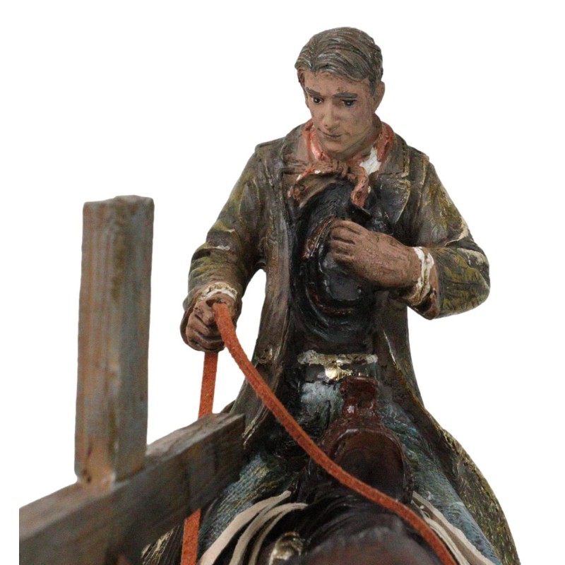 Western Cowboy in Solemn Prayer On Horse By Faded Cross