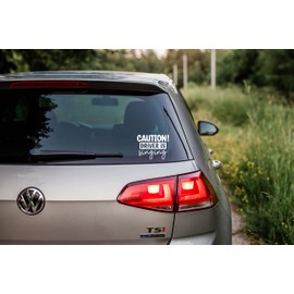 Hatcherabilia Caution Driver is Singing Funny Car Stickers - Van Stickers - Campervan Decals - New Driver Sticker - Bumper Stickers - Funny Car Accessories (White)
