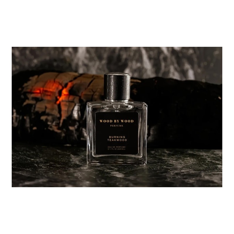A burning bonfire, the scent of wet firewood.Burning Teakwood /