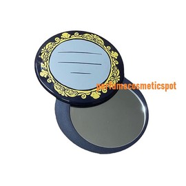 ESTEE LAUDER NAVY WITH YELLOW DESIGNS AROUND SLIDING ROUND COMPACT MIRROR 3"