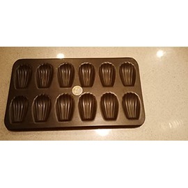 Madeleine Pan 12 Cavities-NONSTICK-Each cavity: 3-1/4"X2". Overall size of pan: 15-1/2"X9"
