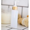 Clear Natural Refillable Plastic Squeeze Bottle with Gold Pump Dispenser