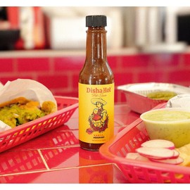 DISHA HOT 1 PACK - Omar Apollo's family recipe combines fresh chilies, garlic, and zesty lime for a layered, smoky heat with a citrusy twist. Infused with natural spices perfect for tacos, marinades, and more
