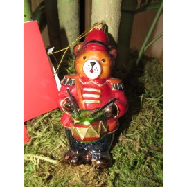 Blown glass Christmas ornament. Holiday nutcracker bear.