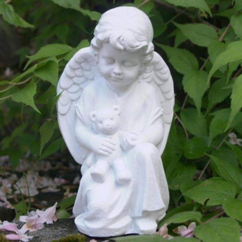 Little Angel with Consolation Teddy Holding in Arms.