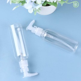 PRETYZOOM 4pcs 100ml Refillable Plastic Pump Dispenser Bottles for Lotion Massage Oil Shampoo Containers Round Pump Bottles Transparent
