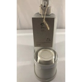 enHome mouthwash dispenser partially made with plant-based materials