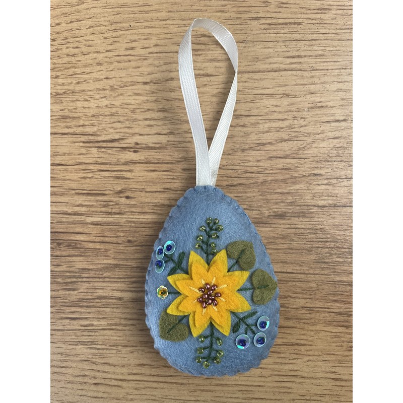 Handmade felt Easter decoration Easter egg with yellow flower