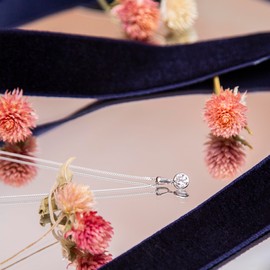 Carissima Gold Women's 9ct White Gold 6.5mm Round White CZ Bezelled Pendant on 9ct White Gold Diamond Cut Curb Chain 46cm/18"