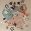 mushie Silicone Baby Bib | Adjustable Fit Waterproof Bibs (Powder