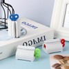 DERDOUT Toothpaste Tube Squeezer,Plastic Rolling Tube Toothpaste Dispenser Tube Wringer