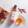 Aceite de ajonjolí picante Inés. Con chile de arbol y