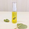 A single drop of natural hair oil with rich herbal