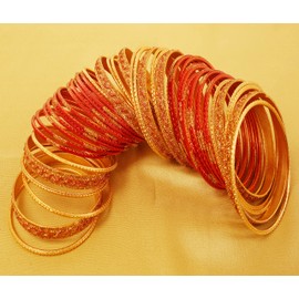 Touchstone New Indian Bollywood Glamorous Fashion Wrist Enhancing Shimmering Golden Glitters Textured Orange Color Designer Jewelry Bracelets Bangle Chura. Set of 48 in Gold Tone for Women.
