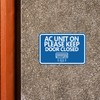 Classic Framed AC Unit On Please Keep Door Closed Sign