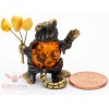 Solid Brass Amber Figurine of tiger holding flowers or amber