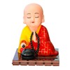 EatingBiting Little Monk Figurine Solar Buddha Monk Shaking Head Statue