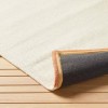 Opalhouse 5' x 7' Tapestry Pattern Border Solid Rug Cream