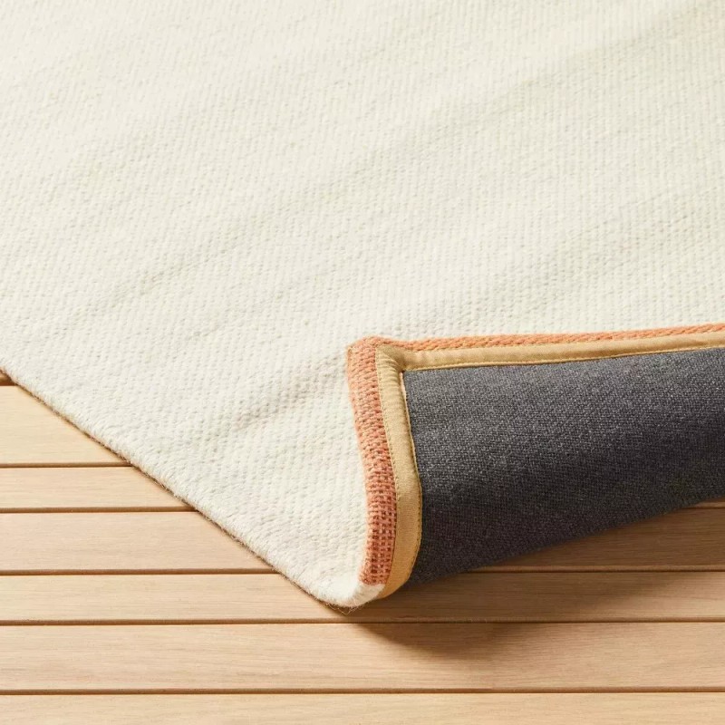Opalhouse 5' x 7' Tapestry Pattern Border Solid Rug Cream
