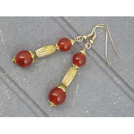 Thurcolas Ohrringe in golden metall in Karneol der Medicis Serie