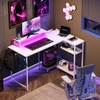 DEVAISE Gaming L Shaped Desk with Power Outlets & LED