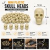 Derkiua 100pcs Mini Plastic Skull Heads for Halloween Decorations