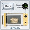 Nostalgia NRMO7YW6A Retro Compact Countertop Microwave Oven, 0.7 Cu. Ft.