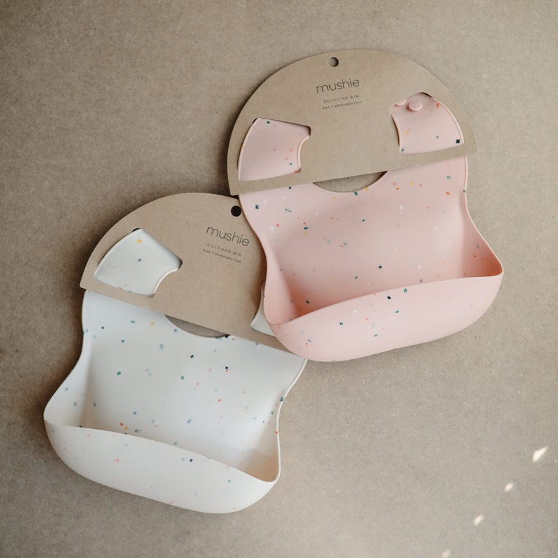 mushie Silicone Baby Bib | Adjustable Fit Waterproof Bibs (Powder