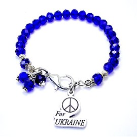 ChubbyChicoCharms Peace for Ukraine Splash Of Color Crystal Bracelet. Gorgeous Deep Sapphire Blue Crystals with Iridescent Colors.