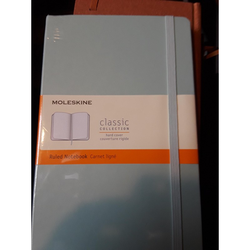 Moleskin classic, hard cover, large filled notebook