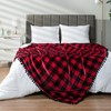 PAVILIA Black Red Fleece Throw Blanket for Couch with Pom