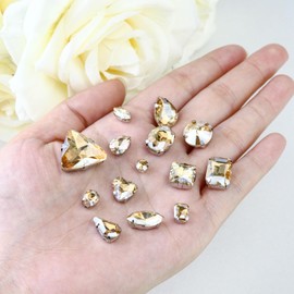 Dowarm - 104 piezas de cristales para coser con forma mixta para manualidades, piedras preciosas de metal con parte trasera plana para hacer joyas, disfraces, ropa, sombra dorada/champaña