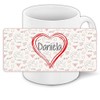 Liebestasse mit Namen Daniela und schönem Love-Motiv mit Herzen -