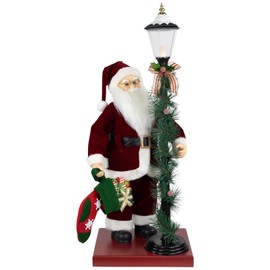 Northlight Animated and Musical Santa Claus Figure with Lighted Lamppost and Christmas Stocking - 31"