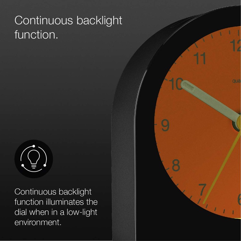 Braun classic analogue alarm clock with snooze and continuous backlight,