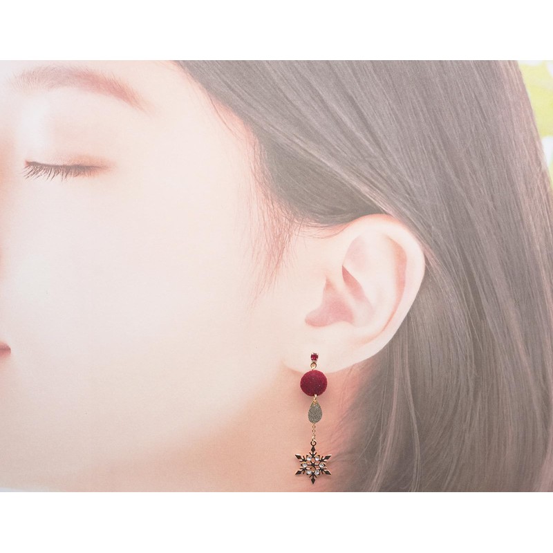 fur ball and snowflake earrings on chain