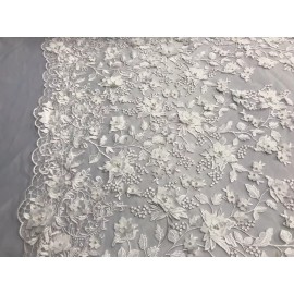 NEW CREATIONS FABRIC AND FOAM INC WHITE PRINCESS 3D FLORAL EMBROIDER WITH PEALS ON A MESH LACE-SOLD BY YARD.