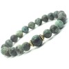 Women's bracelet in green natural turquoise beads and Tibetan beads