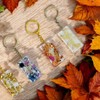 BAQDOVAVN Unique Resin Floral Zodiac Key Chains Charm Keyrings for