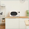 Nostalgia 0.7 Cu. Ft. Retro Compact Countertop Microwave Oven, Ivory