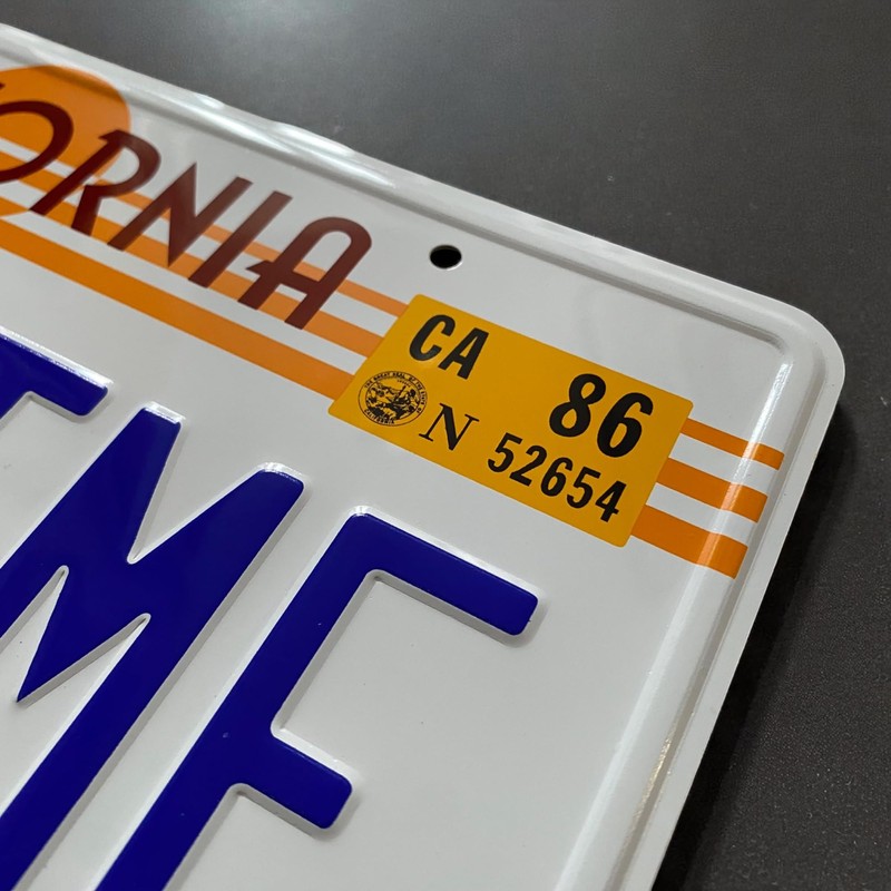 OUTATIME License Plate. Made from Aluminium. Text and License plate