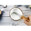3-in-1 Kitchen Peeler, Scrabber & Grater: a cutting tool with