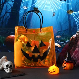 Kolldenn 24 Pcs Halloween Clear Plastic Gift Bags with Handle Trick or Treat PVC Pumpkin Goodie Candy Bags Reusable Tote Bag for Party Favor Gifts Supplies(Pumpkin,9.84x 9.84x 3.54 Inch)
