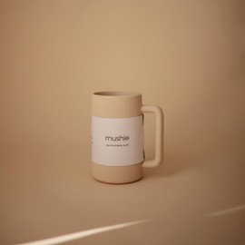 mushie Baby Bath Rinse Cup | 100% Food Grade Silicone | Shampoo & Body Washing Rinser Cup For Kids (Shifting Sand)