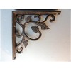 Pair of small cast Iron wall mounted antique style leaf