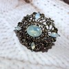 Antique Gold Tone Geometric Foliate Filigree Art Deco Blue Oval
