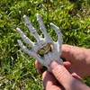 Skeleton Hand Cast Iron Bottle Opener